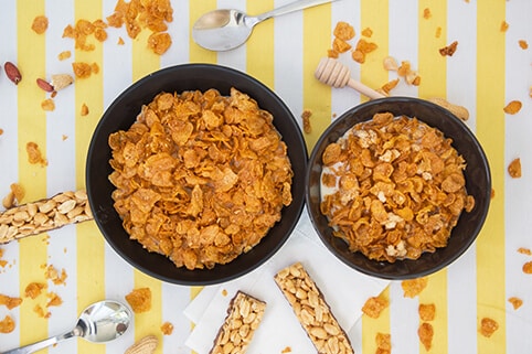 Kellogg’s® Crunchy Nut ® Corn Clusters milk two bowls